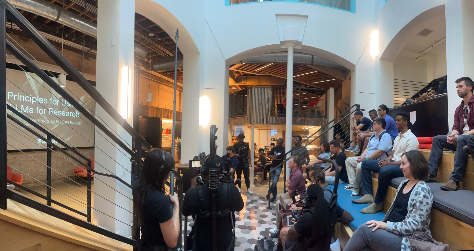 Challengers attending a lecture on LLMs for research in Austin